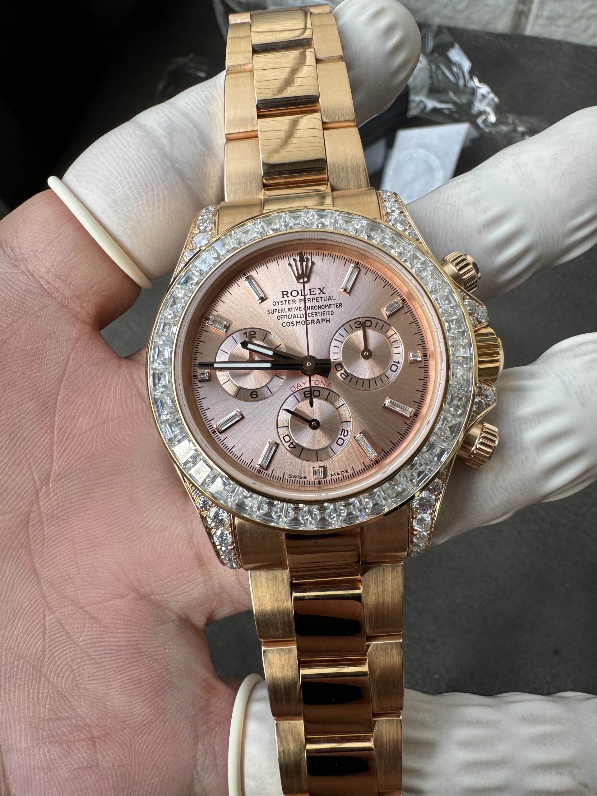 Victory Factory Rolex Custom SuperClone ICE Out Daytona 126595TBR Rose Gold Case Set with Diamonds Pink Dial with Diamond Indexs 4131 Movement 02 1 Clean Factory Rolex Custom SuperClone ICE Out Daytona 126595TBR Rose Gold Case Set with Diamonds Pink Dial with Diamond Indexs 4131 Movement 02 1